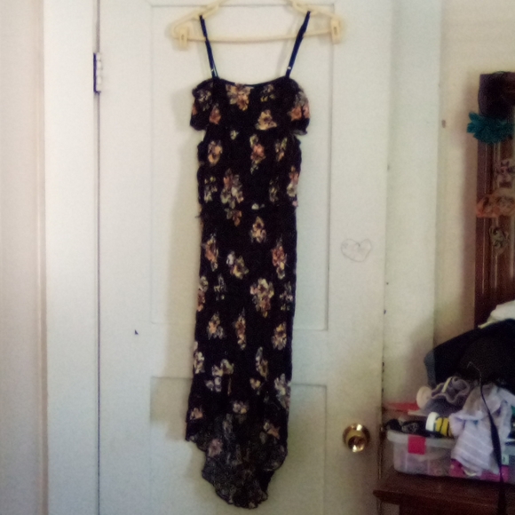 A black dress with flowers on it - Picture 1 of 3